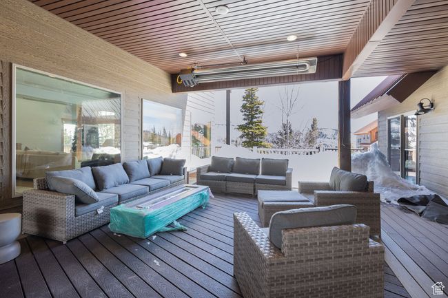 Wooden deck featuring outdoor lounge area | Image 47