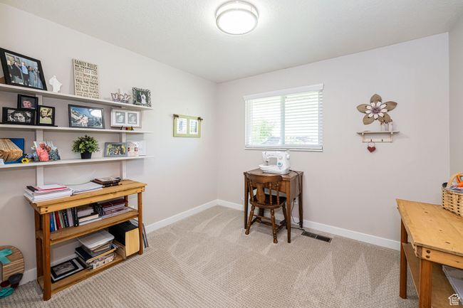 Interior space with baseboards and carpet | Image 29