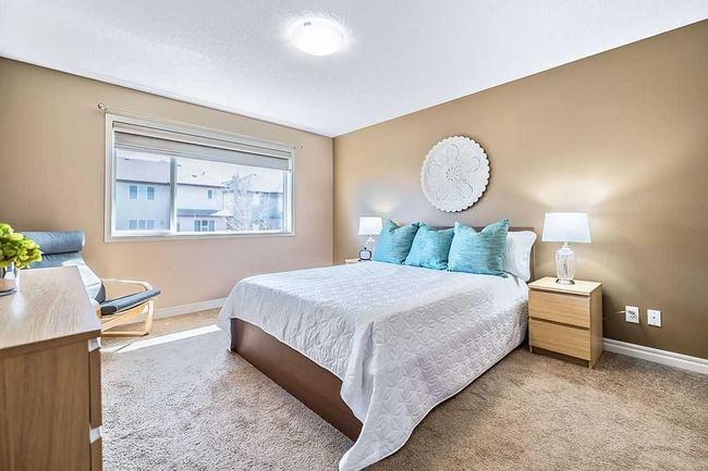 419 Cimarron Blvd, House other with 3 bedrooms, 3 bathrooms and 4 parking in Okotoks AB | Image 31