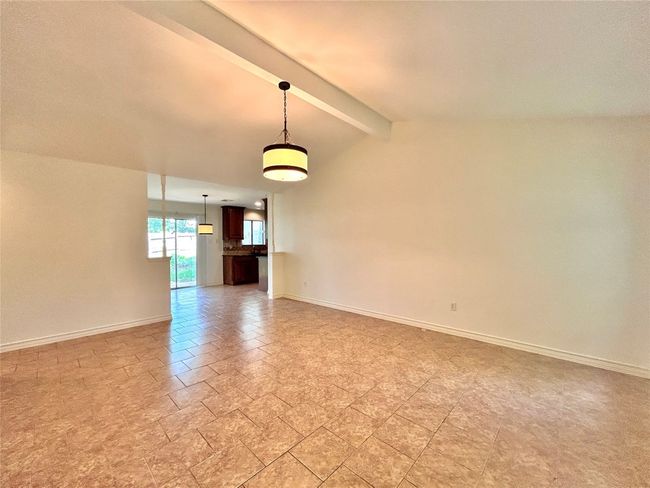 Unfurnished room with baseboards | Image 5