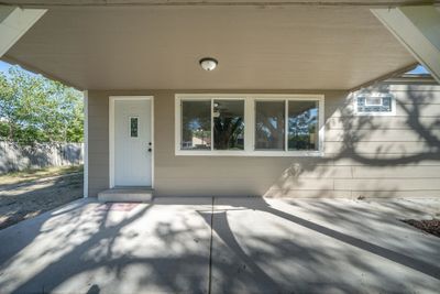 Doorway to property with a patio area | Image 2