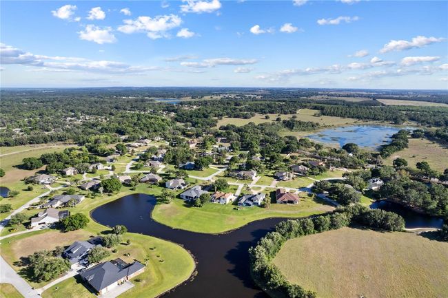 7351 Spring Mountain Ln, House other with 5 bedrooms, 4 bathrooms and null parking in YALAHA FL | Image 74