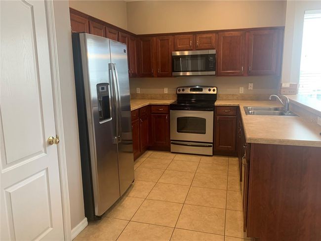 7117 - 7117 Red Lantern Dr, Condo with 3 bedrooms, 3 bathrooms and null parking in HARMONY FL | Image 10