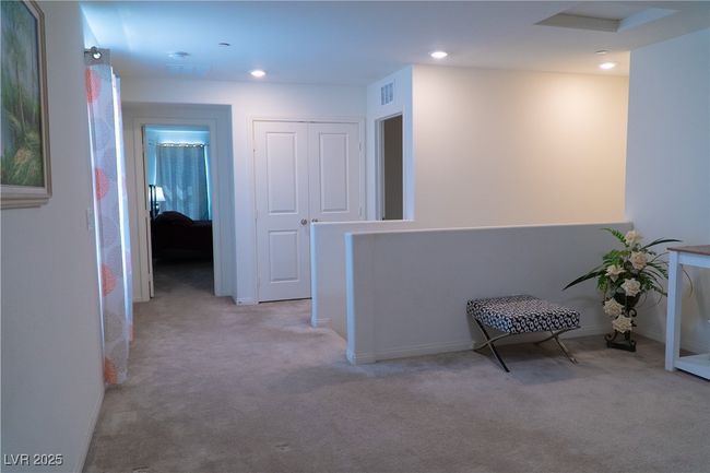 Corridor featuring baseboards, visible vents, carpet, and recessed lighting | Image 46