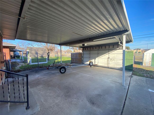 COVERED CARPORT / PATION SPACE WITH ROLL UP DOOR | Image 19
