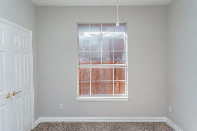Empty room with carpet and baseboards | Image 18