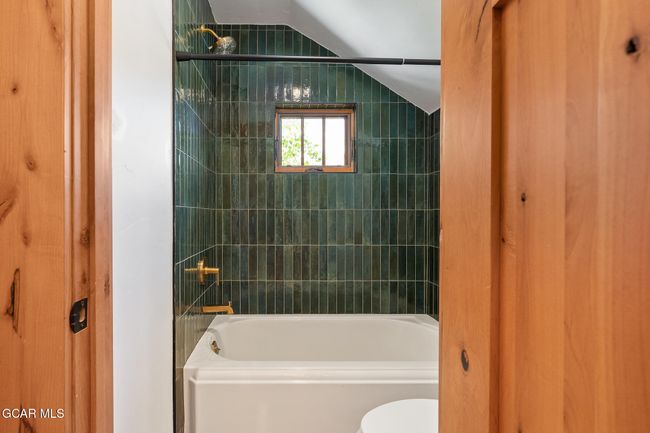 guest bath with oversized tub | Image 20