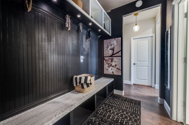 Mudroom with baseboards and dark wood finished floors | Image 26