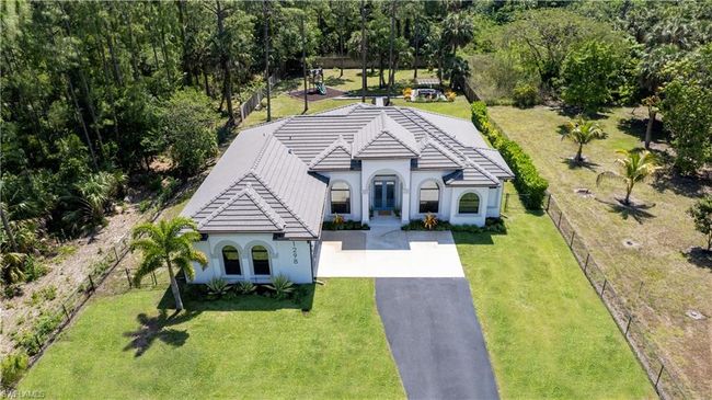1298 23rd St Sw, House other with 3 bedrooms, 2 bathrooms and null parking in Naples FL | Image 2