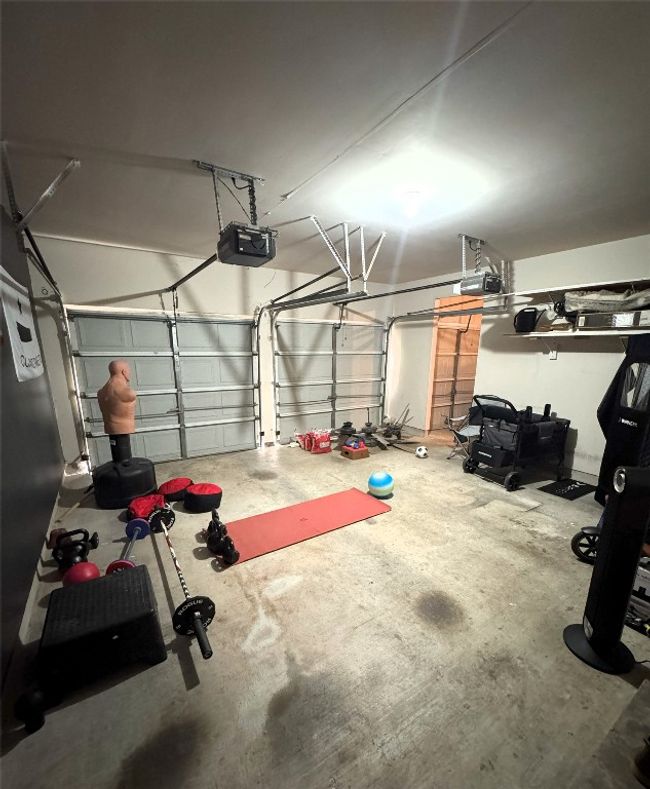 2½-Car garage with a garage door opener. | Image 39