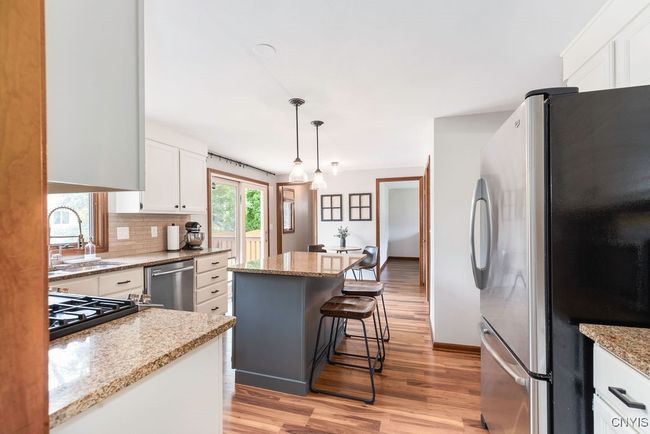 Kitchen View from Family Room. | Image 10