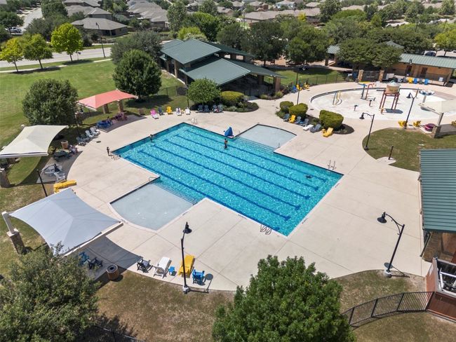 Community pool featuring a patio area | Image 37