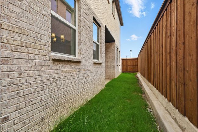 View of home's exterior with brick siding | Image 34