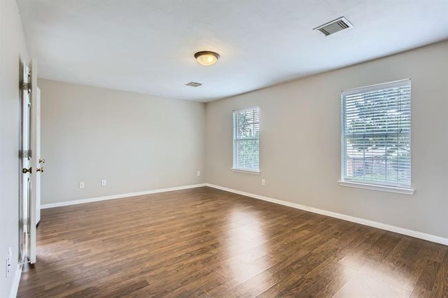 Primary bedroom with plenty of natural light. | Image 24