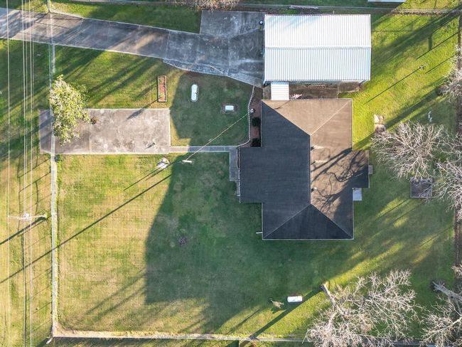 Your lot is fully fenced with 5 producing pecan trees and a private setting! | Image 4