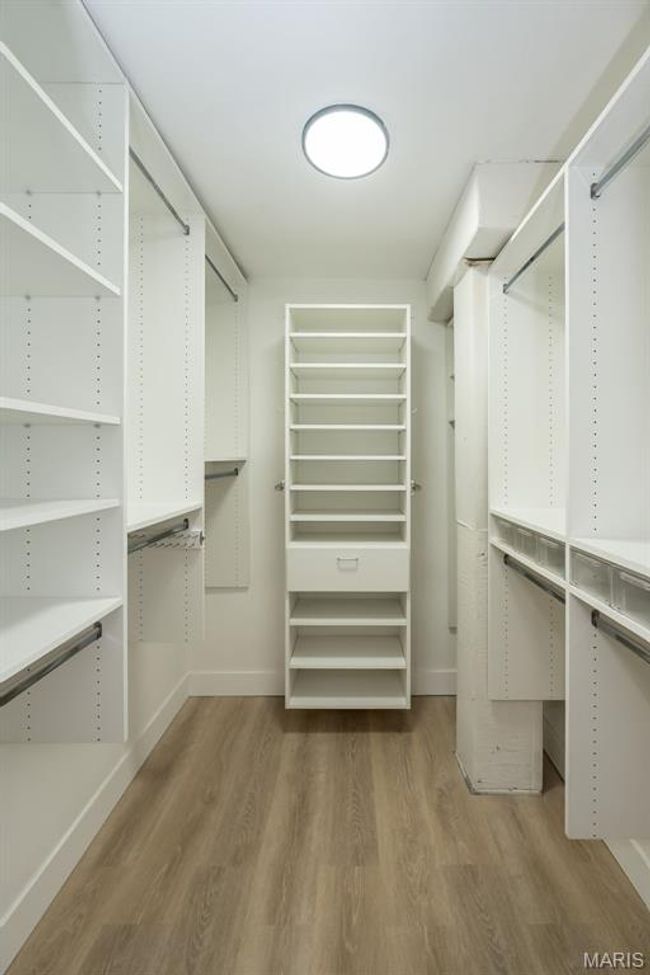Primary walk in closet. | Image 16