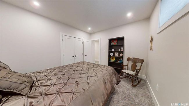 Bedroom with carpet floors and recessed lighting | Image 34