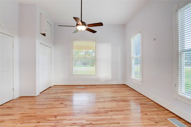 A THIRD SPACIOUS ROOM THAT SHARES FULL BATHROOM. THIS ROOM COULD SERVE AS A BEDROOM ALSO, OR STUDY, ETC. IT LEADS TO A SHORT HALL WITH WIDE CLOSETS ON EITHER SIDE TO THE GREAT ROOM. | Image 14