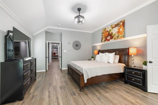 Another view of the primary bedroom from a different perspective. | Image 24