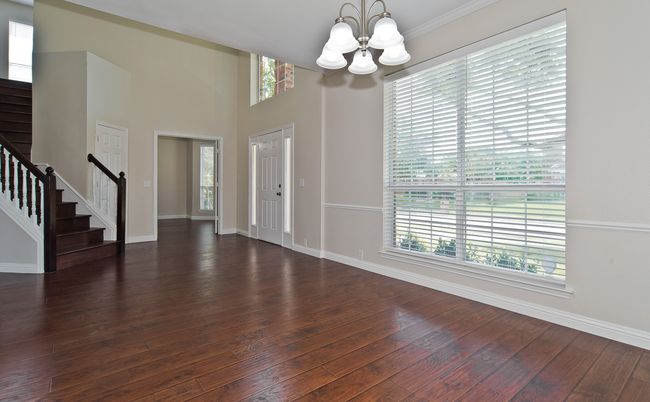 Front Entry is Flanked With Study And Spacious Dining Room! | Image 5