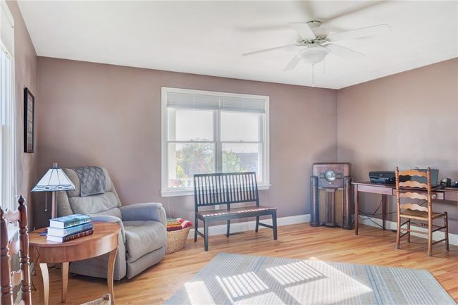 First floor primary, currently being used as a lounge room | Image 15
