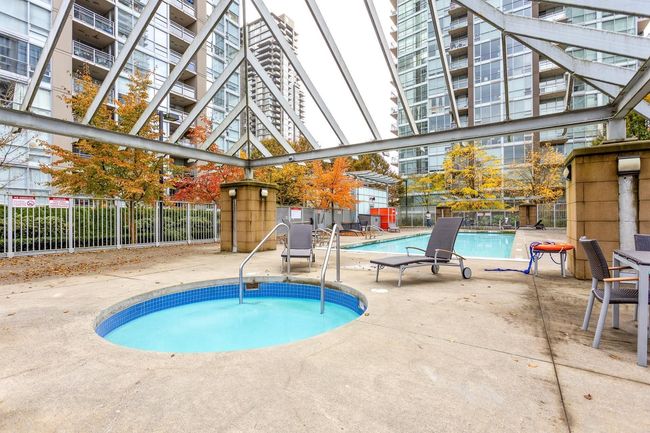 Pool featuring a patio area and fence | Image 21