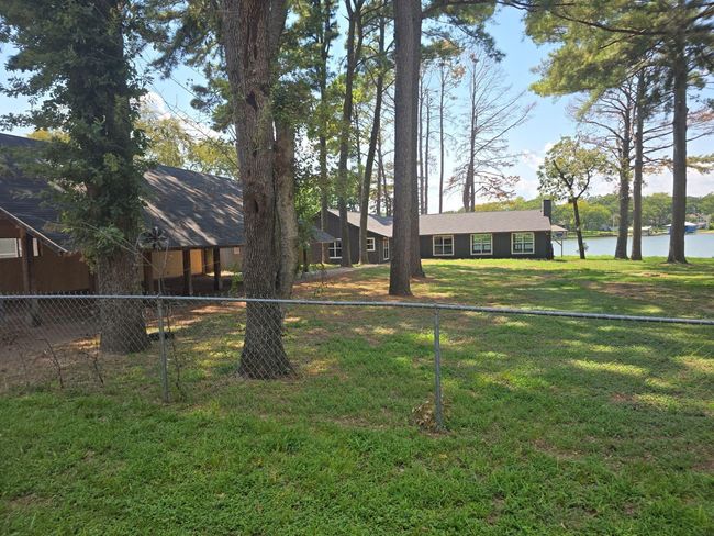 View of yard featuring a water view | Image 19