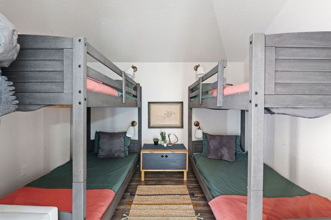 Bedroom with wood finished floors | Image 37