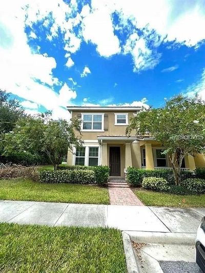 11267 Grander Drive, Townhouse with 3 bedrooms, 2 bathrooms and null parking in Windermere FL | Image 1