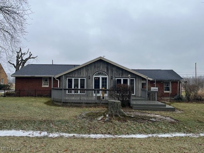 Ranch-style house Newer sun room addition & large patio/deck | Image 5