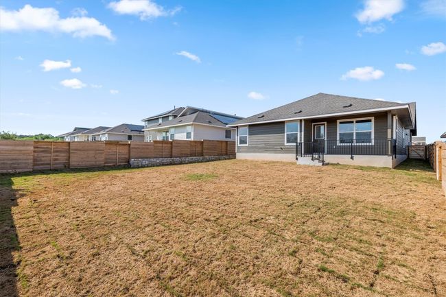 Back of property with a fenced backyard | Image 30