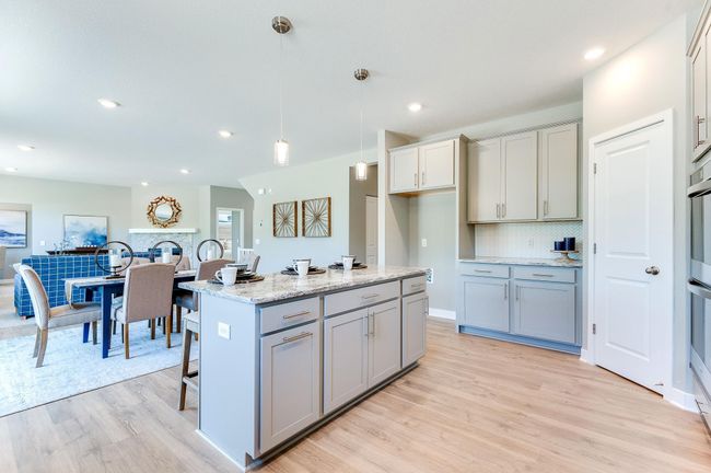 The function extends to the other side of the kitchen space as well, where a six-foot deep walk-in pantry resides. Photo of model home, color and options will vary. | Image 17