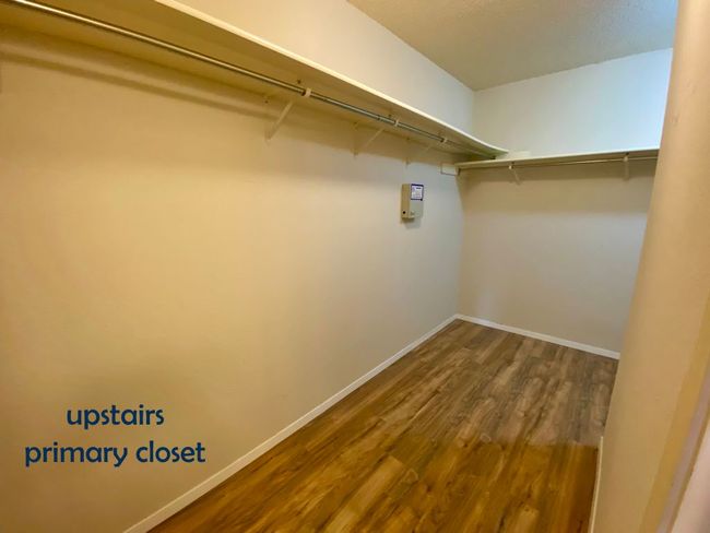 Spacious closet with vinyl floors | Image 20