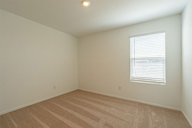 Unfurnished room featuring light carpet and baseboards | Image 17
