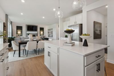 (*Photo of decorated model, actual homes colors and finishes will vary) The spacious and open-concept main level allows for optimal versatility and comfort | Image 3