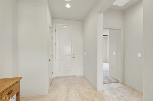 Hallway with recessed lighting and baseboards | Image 27