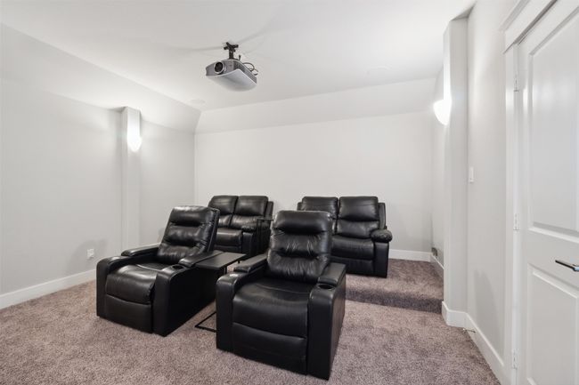 Cinema with carpet floors and baseboards | Image 30