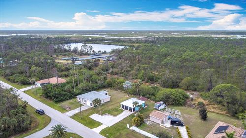 1027 Campbell St, PORT CHARLOTTE, FL, 33953-1613 | Card Image