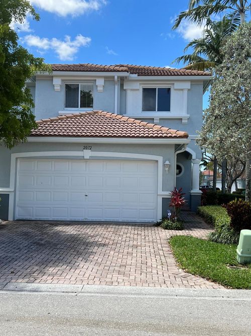 2072 Oakhurst Way, Riviera Beach, FL, 33404-1829 | Card Image