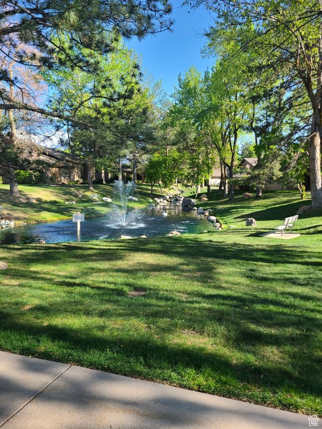 View of property's community with a yard and a water view | Image 32