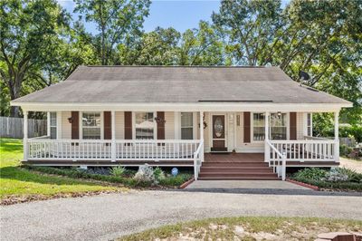 Farmhouse with a porch | Image 1