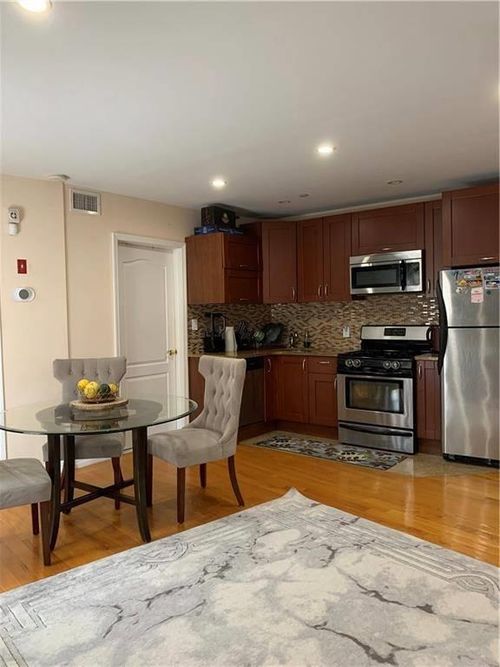 63 Brighton 2nd Pl, Brooklyn, NY, 11235-6817 | Card Image