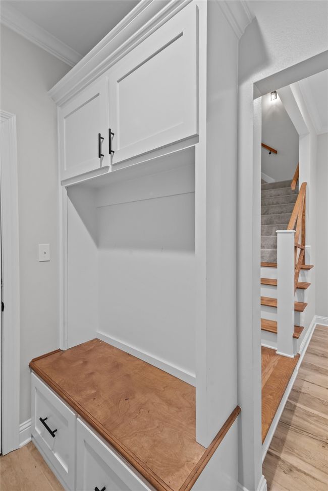 Mudroom featuring ornamental molding and light wood-style floors | Image 20