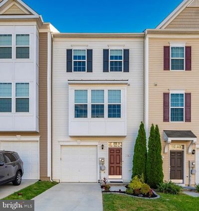 50 Landis Court, Townhouse with 3 bedrooms, 3 bathrooms and null parking in FALLING WATERS WV | Image 1