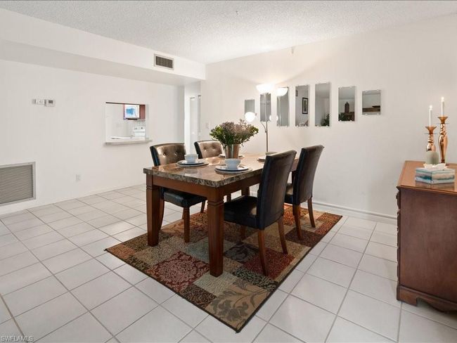 Dining room featuring light tile patterned floors | Image 21