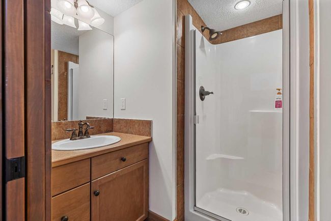 318 - 155 Crossbow Place, Condo with 2 bedrooms, 3 bathrooms and 1 parking in Canmore AB | Image 35