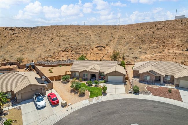 View of subject property featuring a desert landscape | Image 43