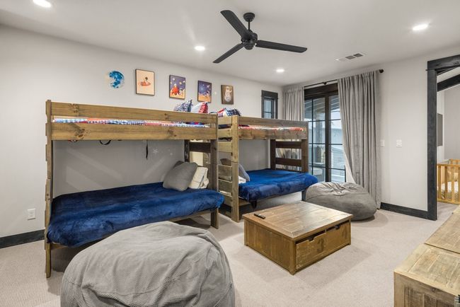 ENTERTAINMENT ROOM OPEN TO LARGE COVERED BALCONY | Image 22