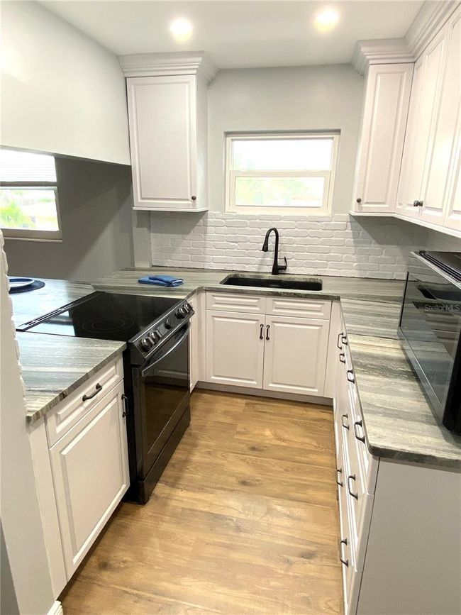 APT-6 - 6000 2 Nd St E, Condo with 2 bedrooms, 2 bathrooms and null parking in ST PETE BEACH FL | Image 4