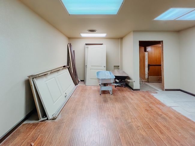 Corridor with light hardwood / wood-style flooring | Image 11